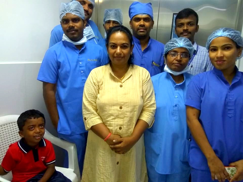 Pushpa Preeya volunteering with doctors