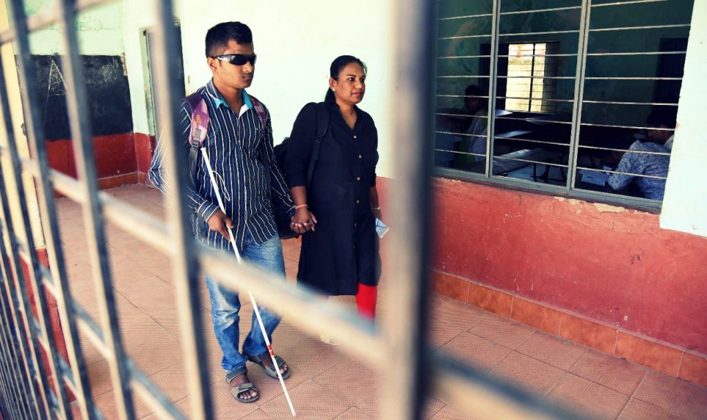 Pushpa Preeya with a blind candidate 